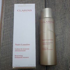 Clarins Nutri Lumiere Renewing Treatment Essence 6.7oz Sealed
