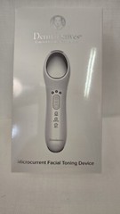 New, White DERMALACTIVES Elastic Collagen Microcurrent Facial Toning Device.