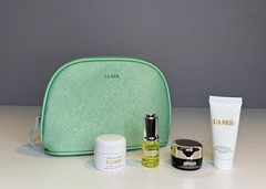 LA MER TRAVEL BAG SET MOISTURIZING CREAM, RENEWAL OIL, EYE CONCENTRATE, & MASK