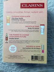 Clarins Mini MVPs Skincare Set With Lip Gloss & Bonus Eye Serum Sample*NIB